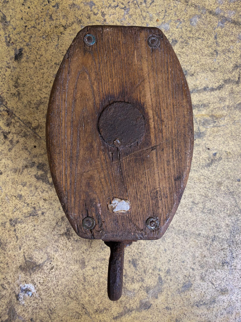 Wooden and iron ship pulley