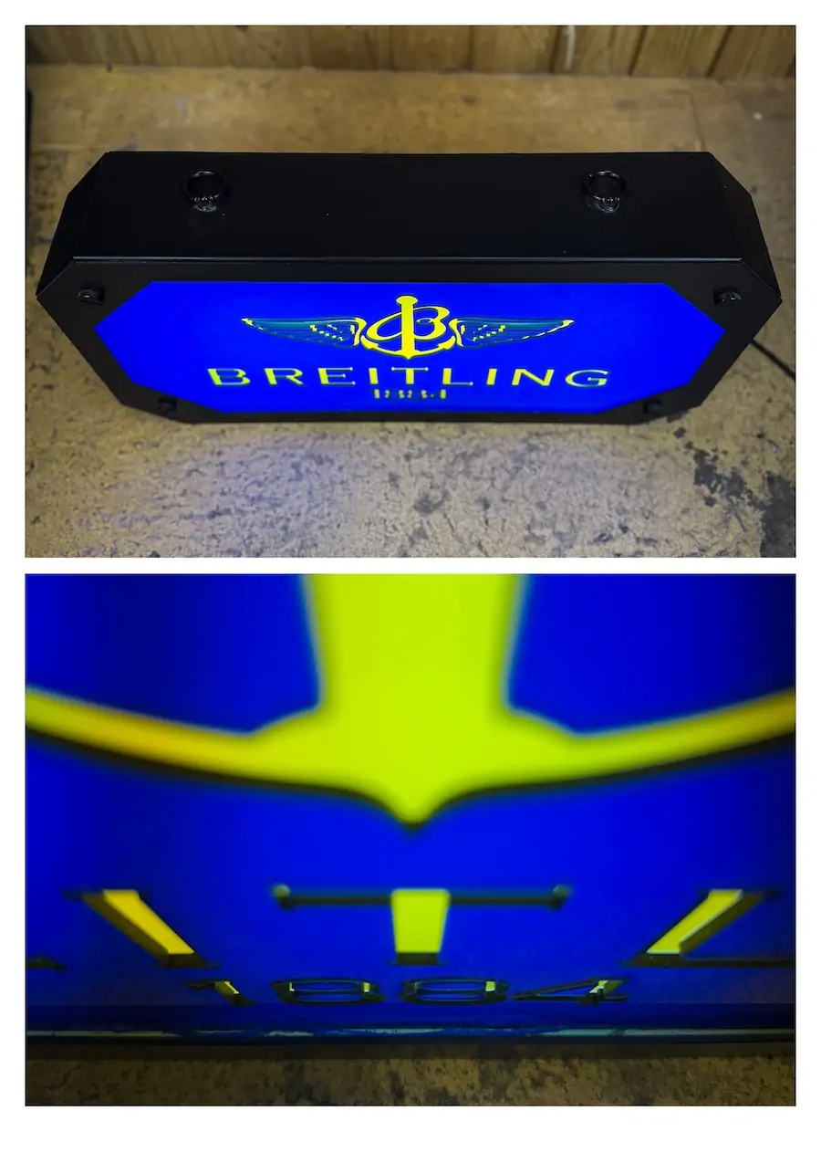 grande enseigne lumineuse Breitling vintage