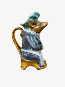 Pichet ancien en faïence barbotine